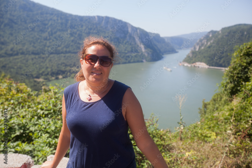 Woman enjoys the view on the Danube river