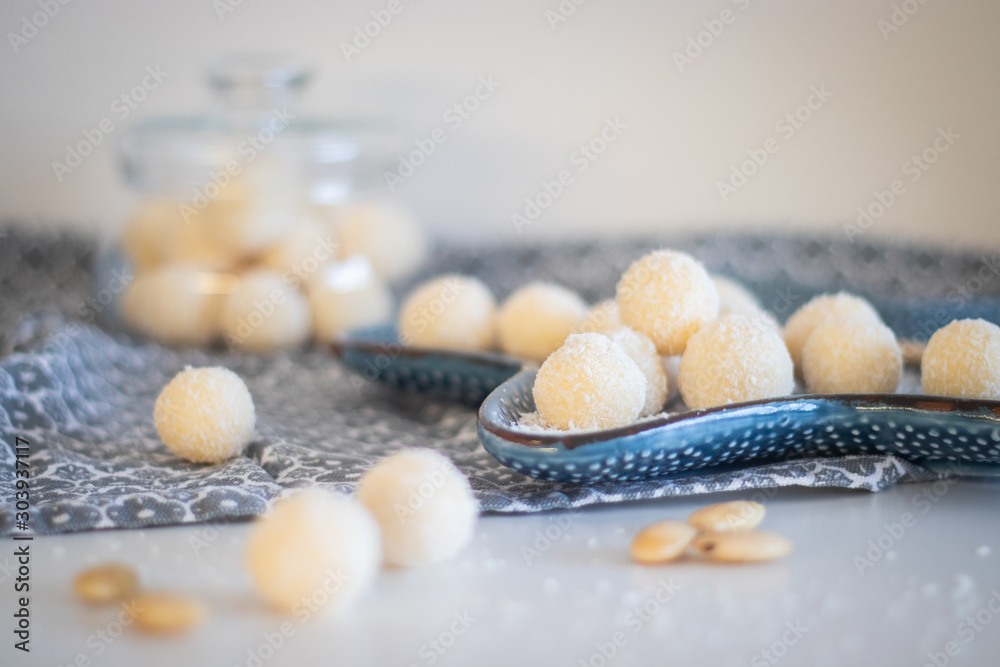 Fresh baked homemade coconut balls, traditional Czech Christmas sweets Fresh baked homemade coconut balls, traditional Czech Christmas sweets