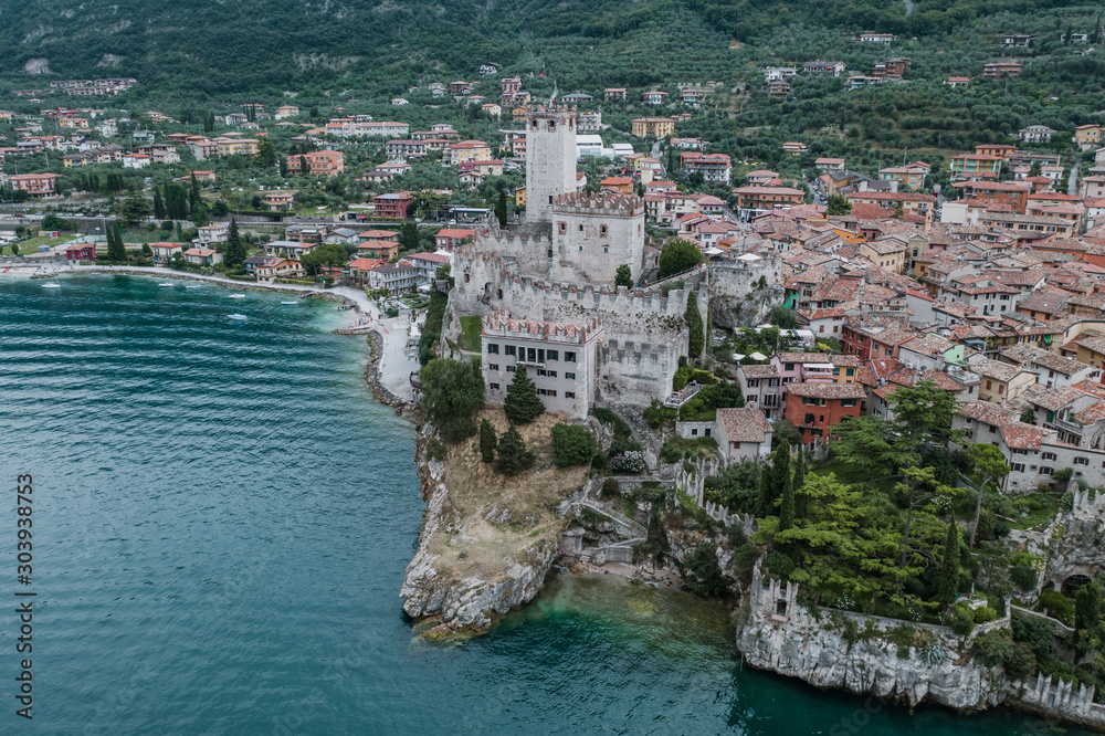 High angle aerial drone shot view of Castello Malcesine village in Italy