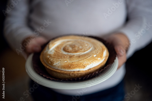 Meringue tart on white background