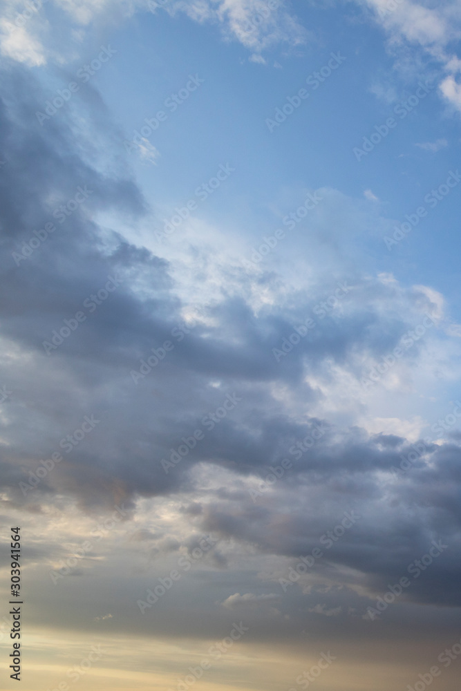 cloudy sky with heavy clouds and sunlights. weather concept