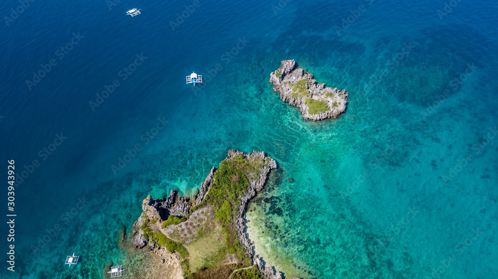 Aerial view on turquoise water with boats