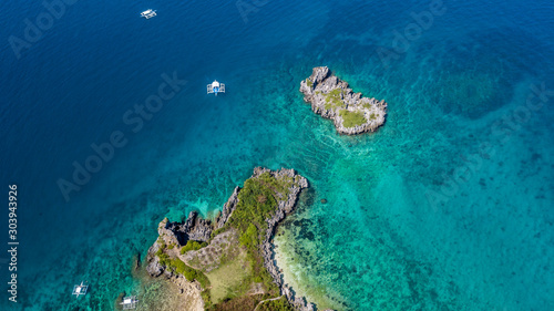 Aerial view on turquoise water with boats