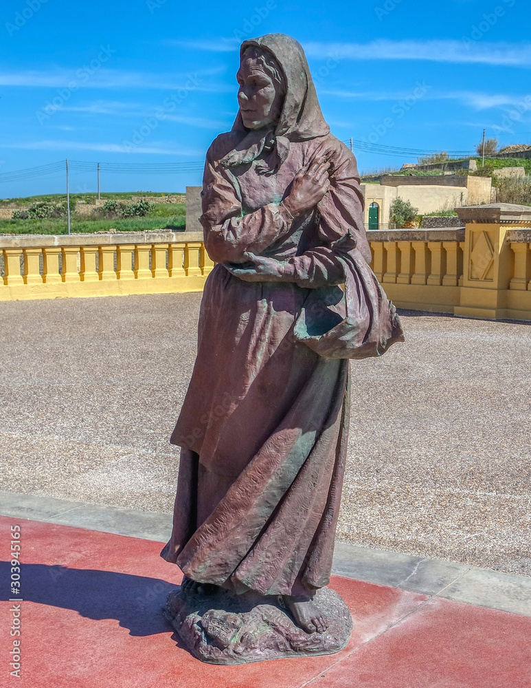 Statue of old woman near Ta Pinu, Gozo, Malta