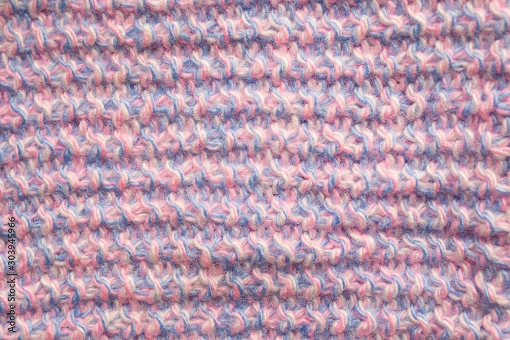 Pink and blue woolen textured pattern background. Material textile surface for clothes