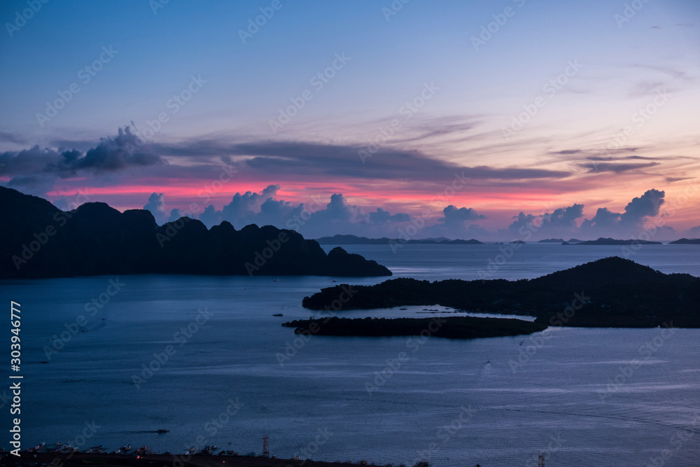 Purple horizon with silhouette of the islands 