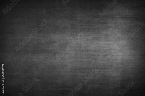 Monochrome dark gray and black paper background.