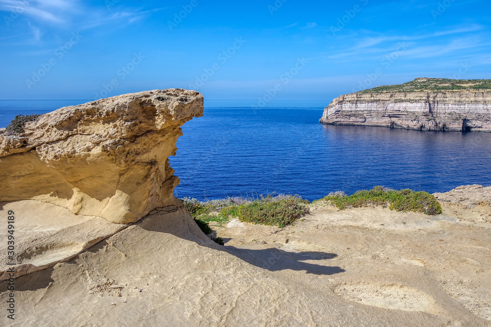 Coast of San Lawrenz with a view on huge limestone cliffs near former Azure Window, Gozo Island, Malta