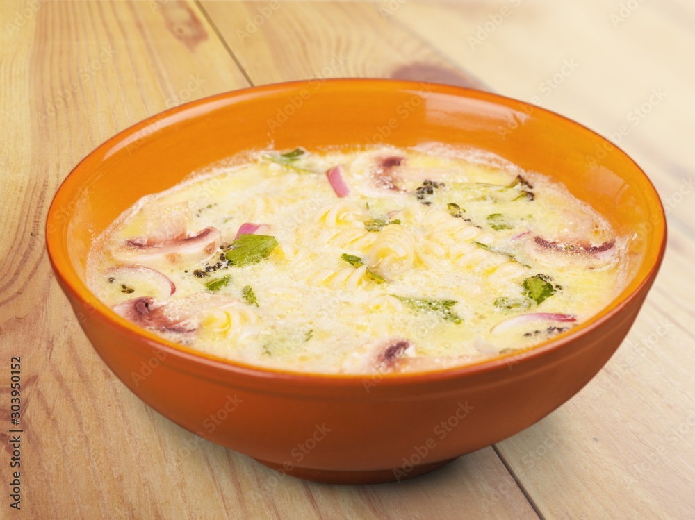 Bowl of delicious vegetables soup on  table