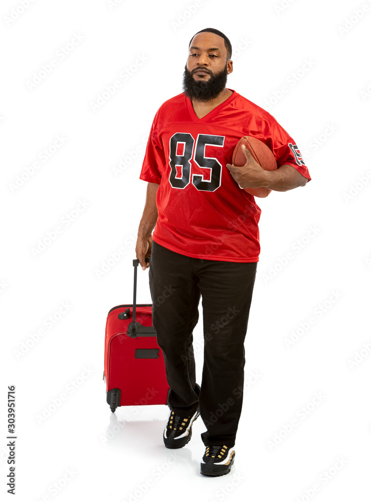 Fan: Man Wearing Sports Jersey With Suitcase And Football Photos | Adobe  Stock