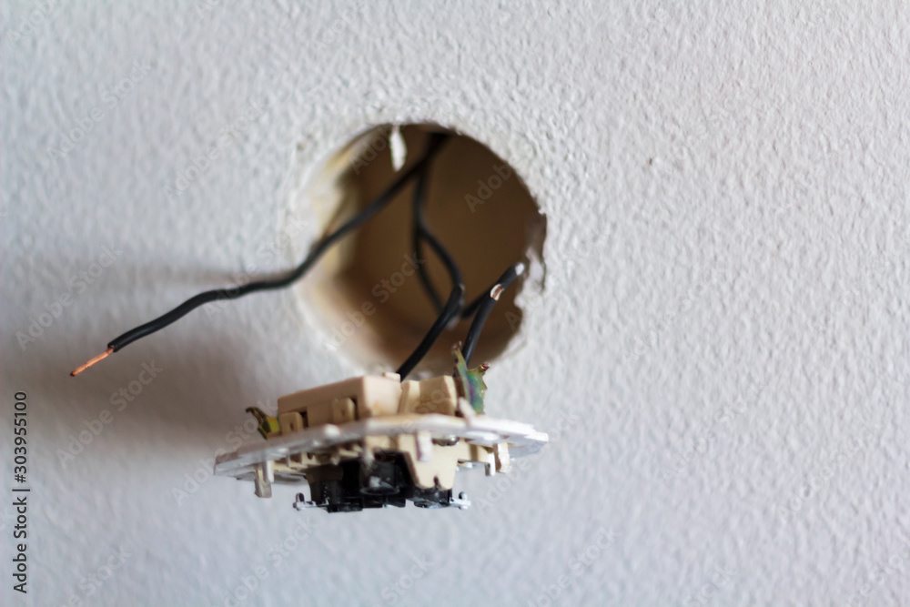 Obraz na plátně Light switch disassembled with exposed wires