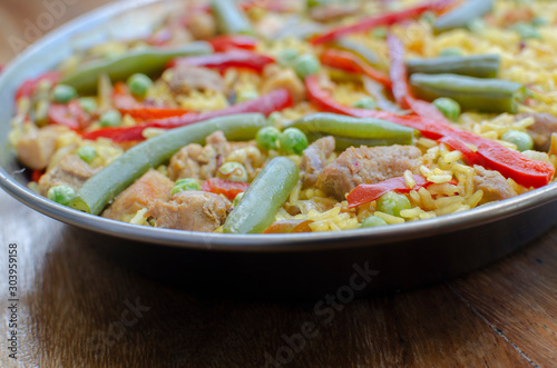 Valencian paella, chicken, pork and vegetables - Spanish cuisine