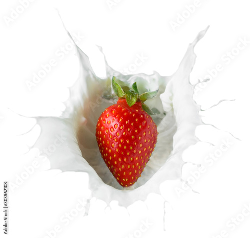 juicy sweet strawberries falling into a bowl of milk cream with splashes in all directions  isolated on white