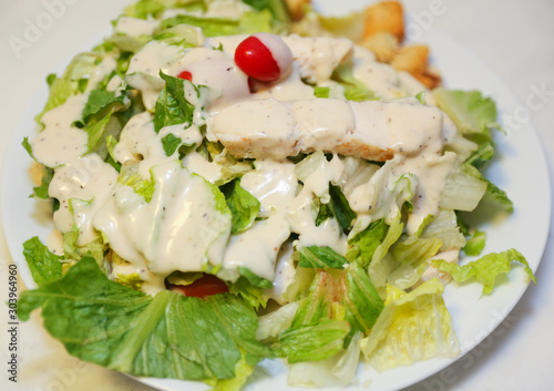 Fresh salad with chicken breast, arugula and tomato. Top view - Image