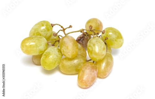 Ripe bunch of light grapes on a white background.