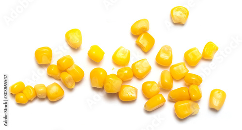 Yellow corn seeds isolated on a white background.