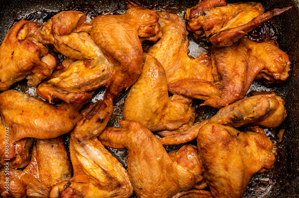 Cooking fried chicken wings. Food. Cooking fried chicken wings. Food.