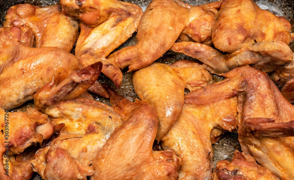 Cooking fried chicken wings. Food. Cooking fried chicken wings. Food.