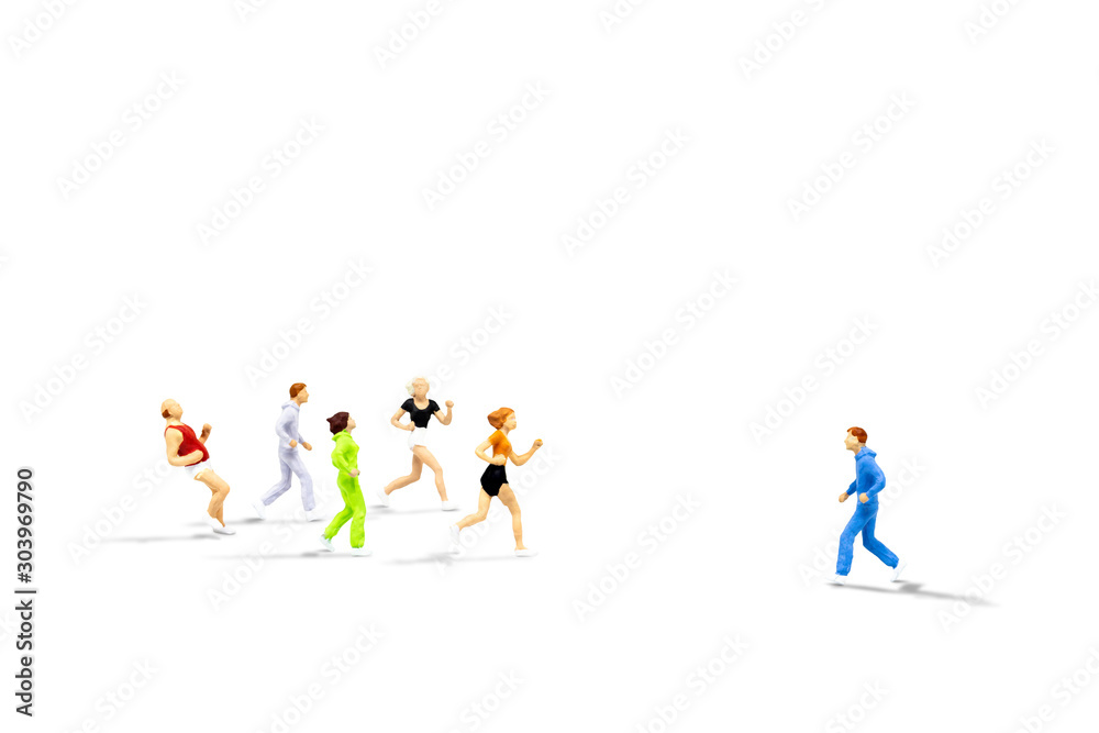 Fototapeta premium Business Leader and Teamwork Concept : Miniature people as alone runner jogging opposite direction with mass of other runners isolated on white background.