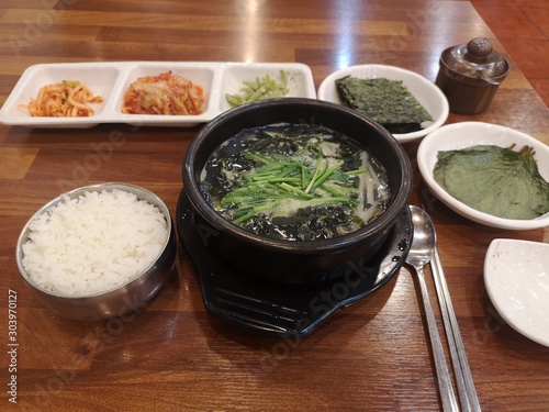 bowl of rice and chopsticks