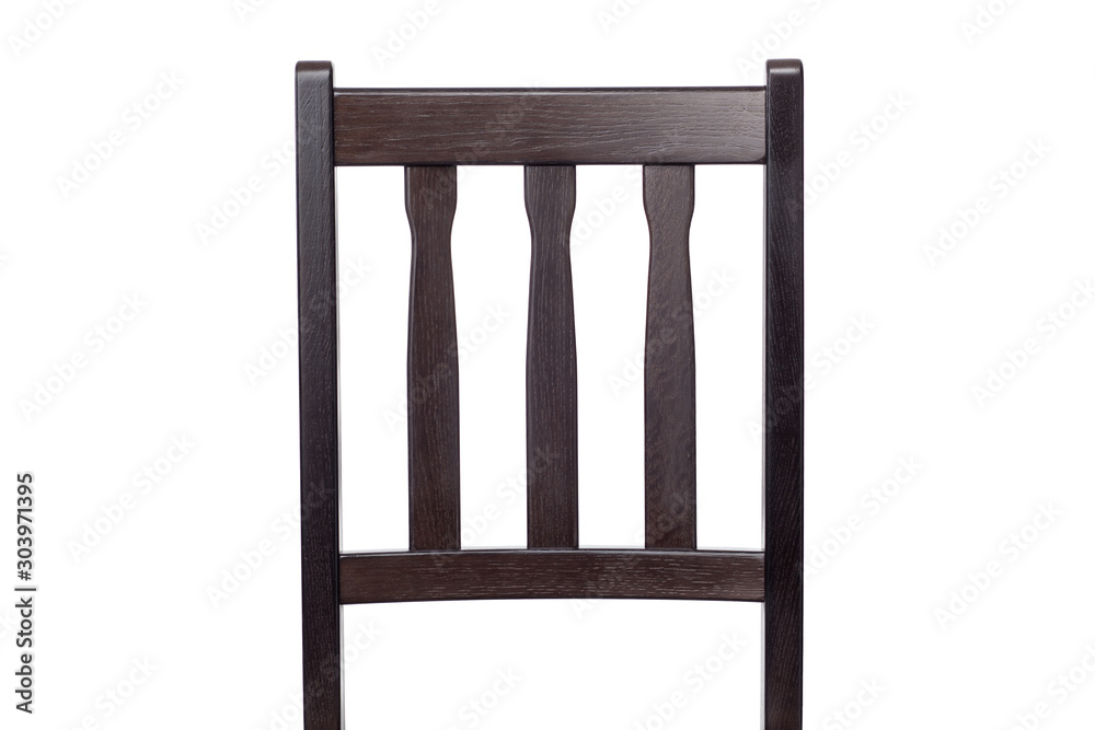 The back of a brown wooden chair, close - up. The back of a brown wooden chair, close - up.