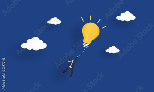 Businessman flying out by light bulb of idea, Concept inspiration business, Paper cut