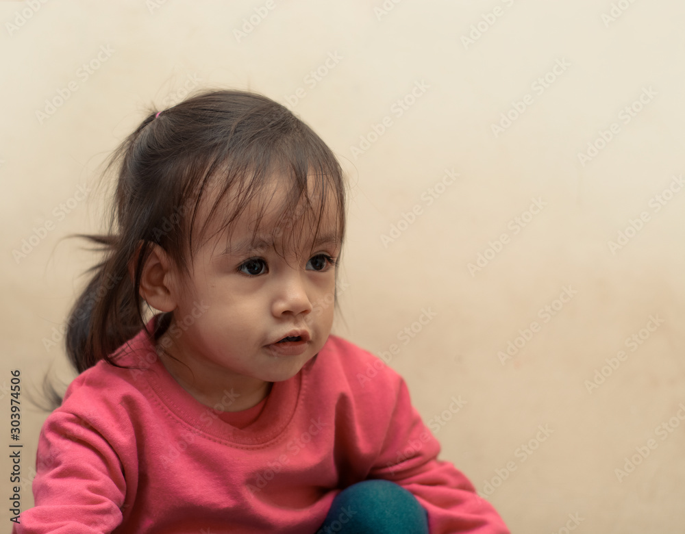 Beautiful girl looking up, space to insert text or design Beautiful girl looking up, space to insert text or design