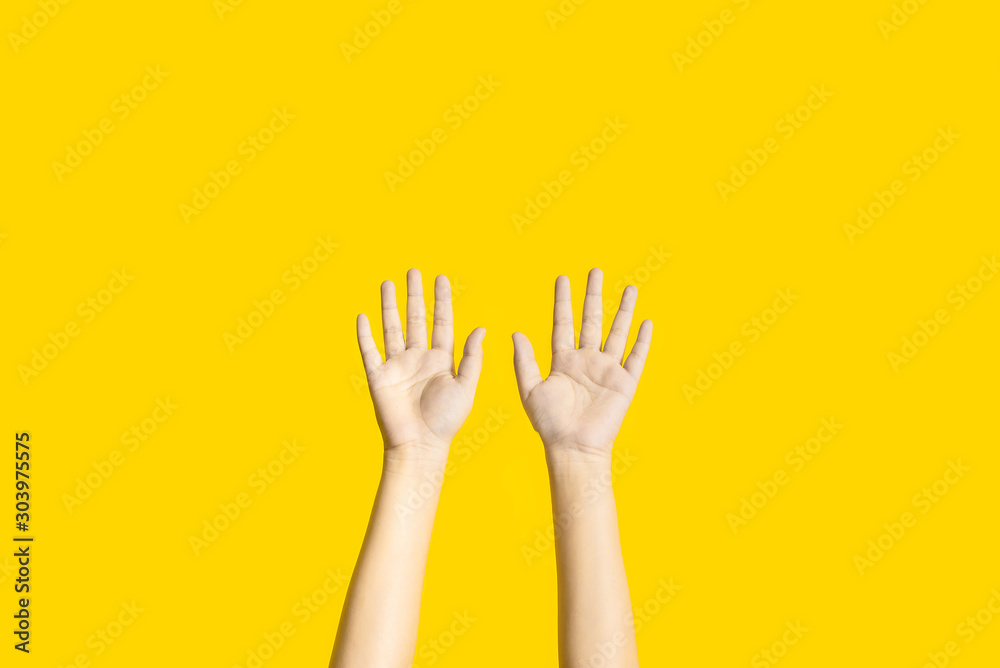Right and left hands calling for help on yellow background. Right and left hands calling for help on yellow background.