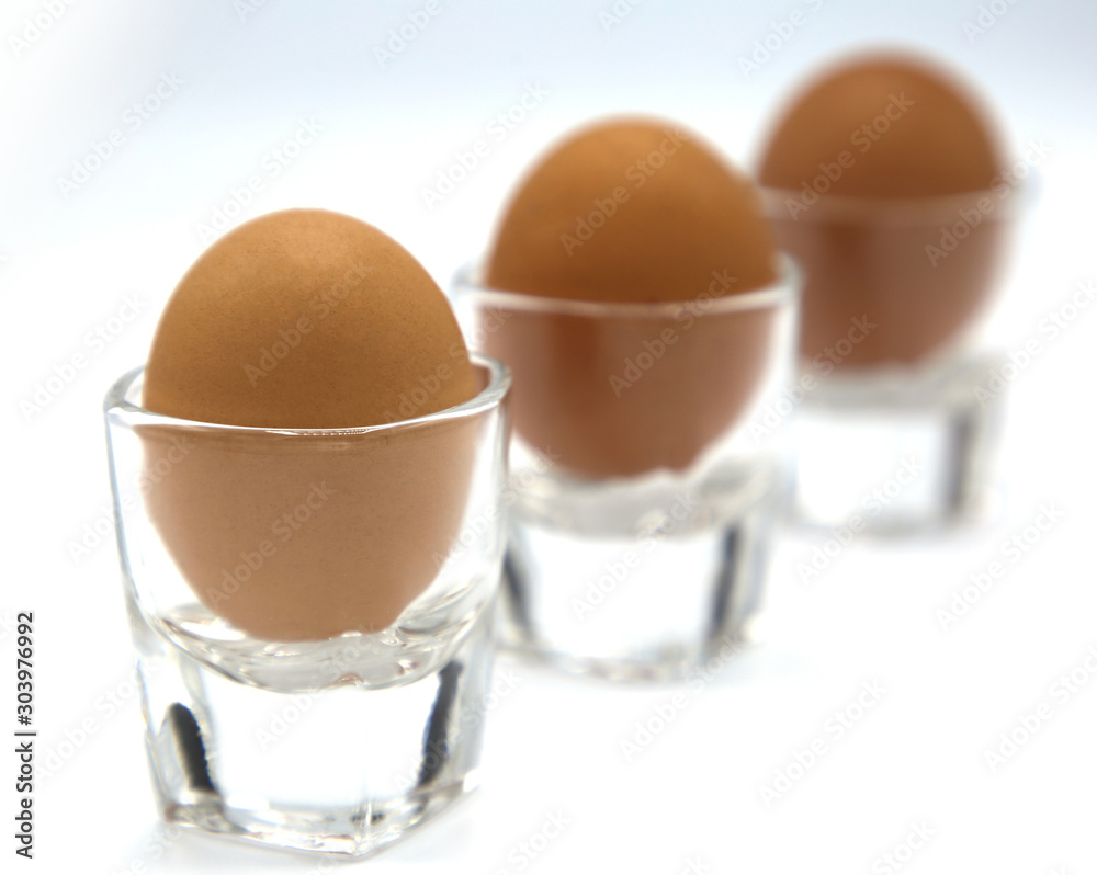 Brown chicken egg isolated on white background Brown chicken egg isolated on white background