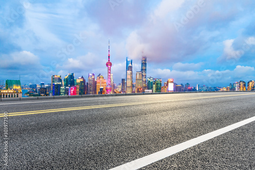 Asphalt highway and beautiful cityscape in Shanghai at night.