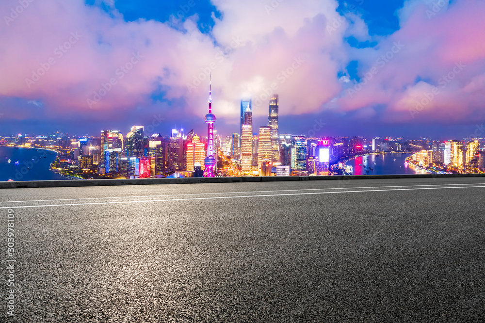 Asphalt highway and beautiful cityscape in Shanghai at night. Asphalt highway and beautiful cityscape in Shanghai at night.