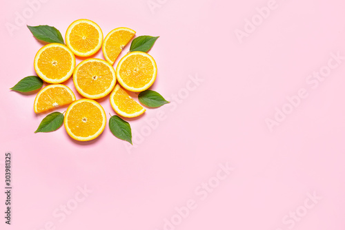 Fresh orange slices on color background