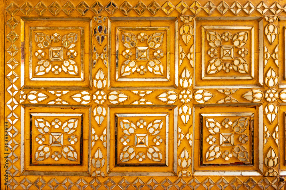 Mirror mosaic on the exterior of a building at the Mandalay Palace or Royal Palace is the last royal palace of the last Burmese monarchy located in Mandalay, Myanmar, formerly Burma Mirror mosaic on the exterior of a building at the Mandalay Palace or Royal Palace is the last royal palace of the last Burmese monarchy located in Mandalay, Myanmar, formerly Burma