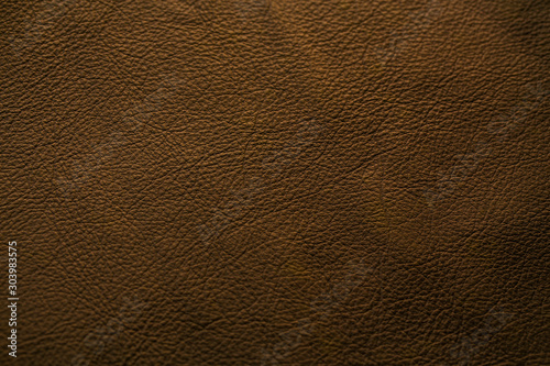 Abstract luxury leather brown texture for background. Dark colour leather for work design or backdrop product.