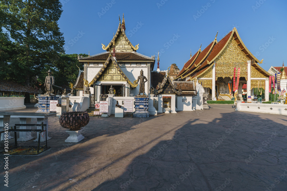 Wat Chedi Luang temple which with a large pagoda and big golden buddha in the Chiang Mai, Thailand