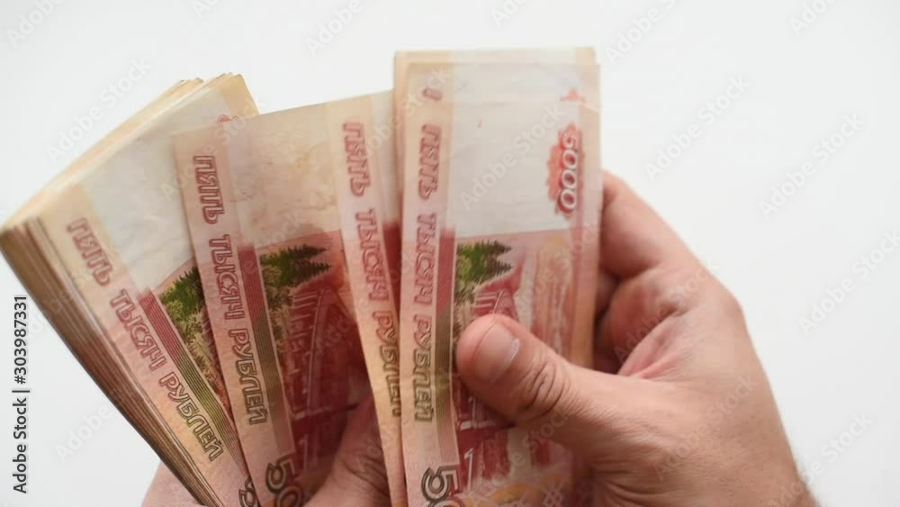 man counting russian money five thousandths rubles man counting russian money five thousandths rubles