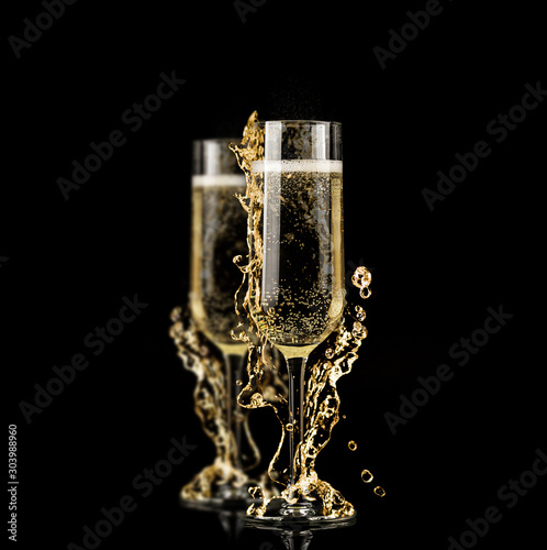 champagne glasses with splash