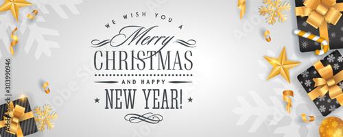 Merry Christmas and Happy New Year light background template with gold glitter decoration elements and calligraphy
