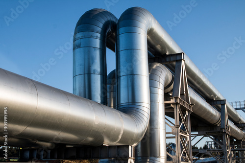 Overground heat pipes. Pipeline above the earth conducting heat for heating city photo