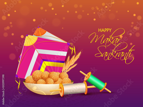 Calligraphy of Happy Makar Sankranti with Indian sweet (Laddu), colorful kite, string spool on purple and orange bokeh background.