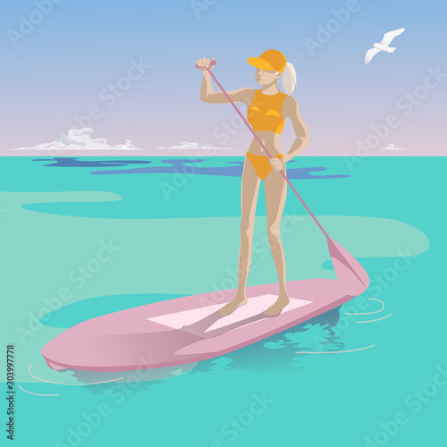 Young slender girl on a paddle with an oar on a background of blue sky and turquoise sea. © Elena