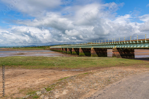 Railway Bridge over the River Esk, seen near Newbiggin, Cumbria, England, UK photo