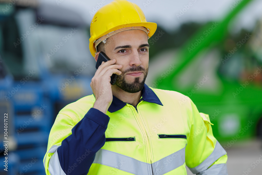man engineer using mobile outdoors man engineer using mobile outdoors