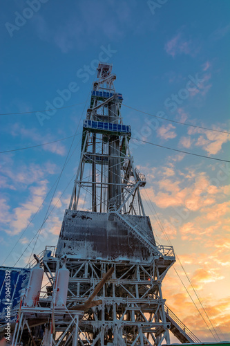 Winter polar day in the arctic. Drilling a well at a northern oil and gas field. Low sun. Beautiful lighting.
