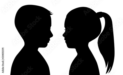 Black silhouette of a boy and a girl on a white background. The faces are facing each other.  Vector illustration of a contour of the head. Male and female profiles. Children, teens. © Lyudmyla