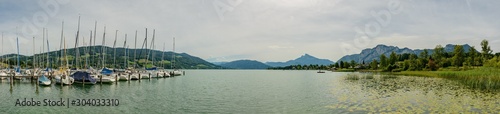 panorama landscape with lake clouds and boats