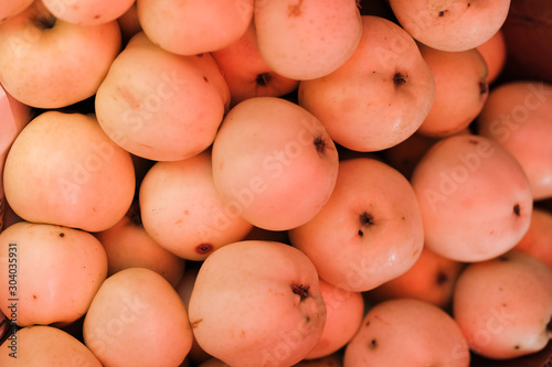 juicy yellow apples at a farmers market. Organic food. non-GMO fruits