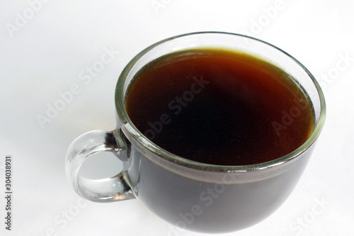  Black coffee in a glass transparent cup.