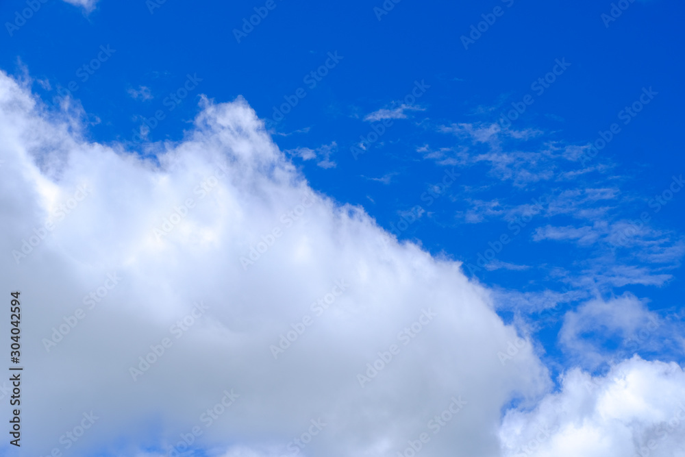 Beautiful blue sky with white gorgeous fluffy cloudy flowing with the wind Beautiful blue sky with white gorgeous fluffy cloudy flowing with the wind