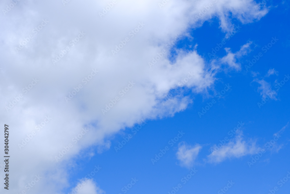 Beautiful blue sky with white gorgeous fluffy cloudy flowing with the wind Beautiful blue sky with white gorgeous fluffy cloudy flowing with the wind